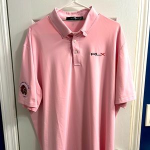 Lightly worn RLX solid polo. Signature logo embroidered at left chest